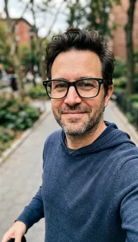 Portrait selfie of a man with glasses