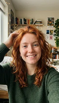 Portrait selfie of a woman with red hair